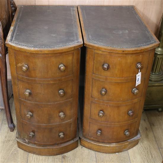 A pair of walnut bow fronted pot cupboards W.35cm